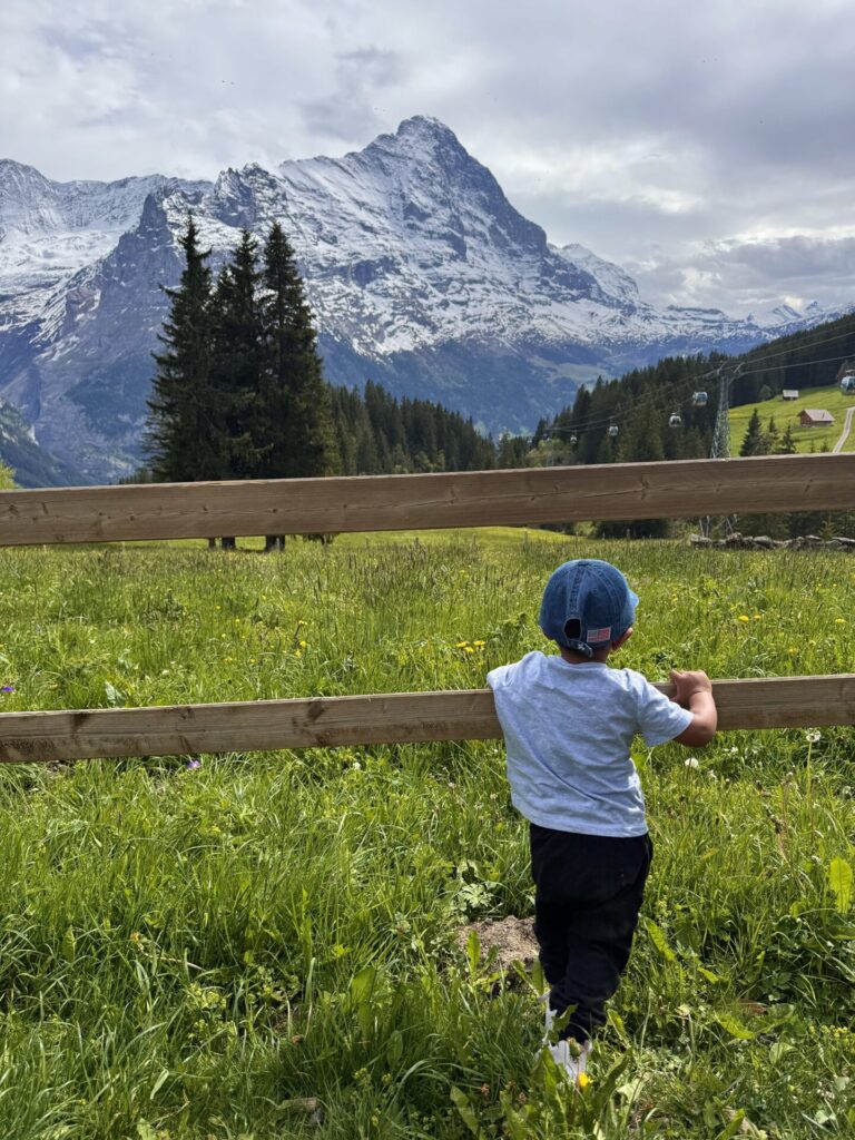 Alpine playground stop in Grindelwald with toddler