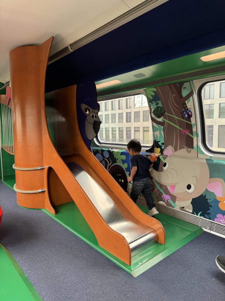 Family train ride on our Switzerland itinerary with a toddler
